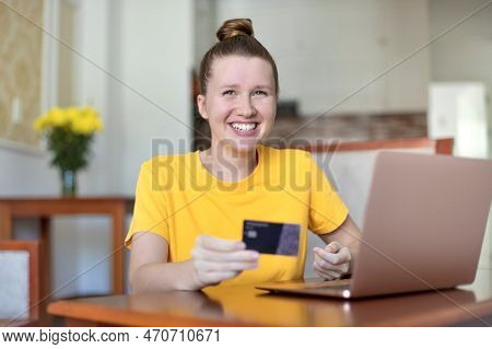 Portrait Of Happy Girl, Young Positive Pretty Woman Paying, Holding Credit Bank Card With Phone, Lap