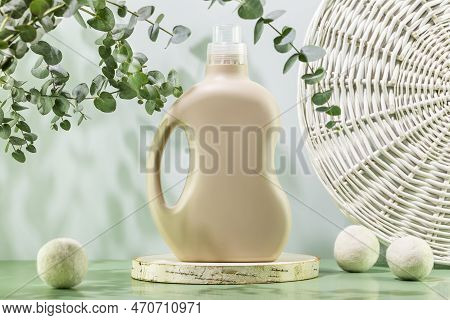 Natural Laundry Detergent Mockup. Washing Detergent Concept With Bottle Of Washing Gel Or Fabric Sof