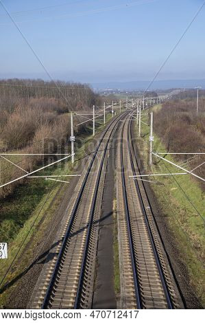 Rails With Electrification For Highspeed Train In Germany Under Blue Sky