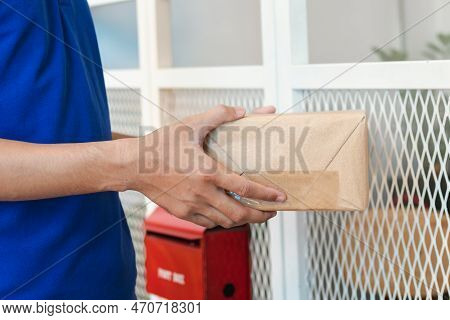 Delivery Man Employee, Postman Hold Cardboard Box,parcel Or Packet For Send To Client,customer In Bl