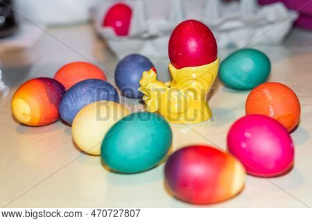 Colourful Self-dyed Easter Eggs In An Egg Cup And An Egg Carton, Germany