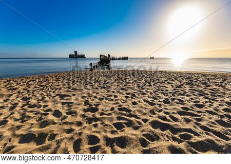 Gdynia, Poland - April 2022: Babie Doly Beach With Old Ruins Of Pier And Ruins Of Torpedo Room On Th