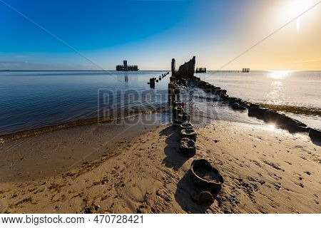 Gdynia, Poland - April 2022: Babie Doly Beach With Old Ruins Of Pier And Ruins Of Torpedo Room On Th