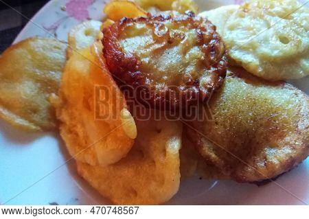 Delicious Sort Of Cake On A Plate. Bangladeshi Traditional Cake. Sort Of Cake Made With Rice, Sugar,