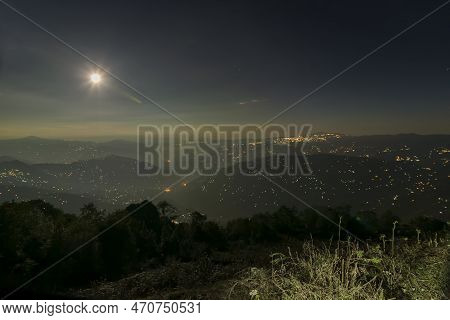 Pearls Of Light Of Queen Of Hills, Darjeeling Town, At Night At Far Right. Full Moon On The Night Sk
