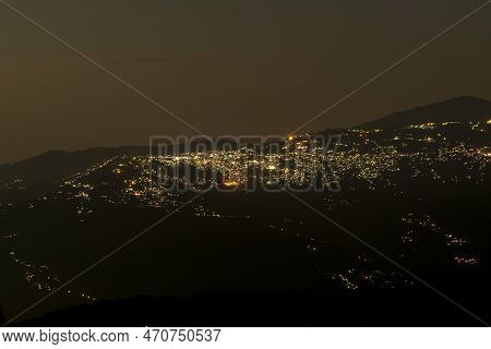 Pearls Of Light Of Queen Of Hills, Darjeeling Town, At Night. In The Eastern Himalayas, To The West 