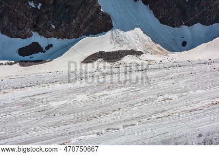 Minimalist Mountain Landscape With Large Glacier And Rocks With Snow In Sunlight. Minimal Nature Bac