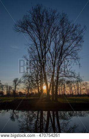 Sunset Along The Dender Riiver On A Winter Evening.