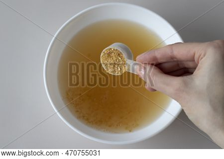 Bone Broth Powder. Cooking A Healthy Superfood Broth.