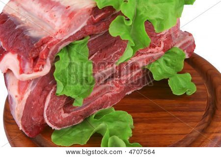 Asado uncooked บนถาดไม้