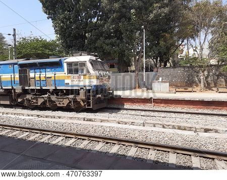 Closeup Of Beautiful Mandya Railway Station And Electric Train Moving On A Track.