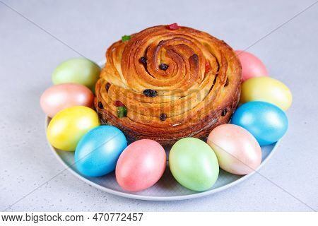 Craffin (cruffin) With Raisins And Candied Fruits. Traditional Easter Bread Kulich And Painted Eggs 