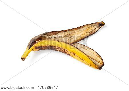 Overripe Banana Peel Isolated On White Background. One Overripe Banana Close-up. Food Waste