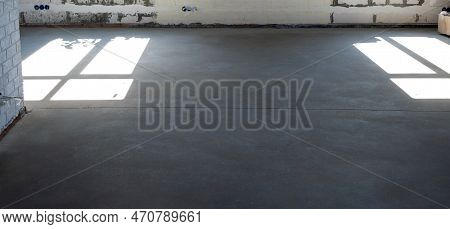 The Leveled Rough Floor In A House Under Construction With A Semi-dry Cement Screed Is A Smooth Surf