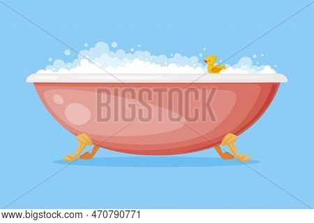 Cast Iron Bathtub On Claw Foot Pedestal Full Of Water With Soap Bubbles Foam Isolated On Blue Backgr