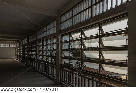 Ancient Steel Awning Windows Open For Bright Light Streaming Through The Corridor Interior The Ancie