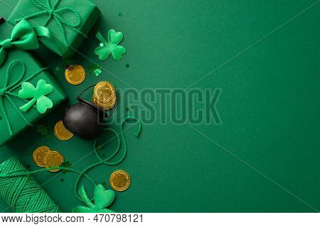 Top View Photo Of Saint Patrick's Day Accessories Present Boxes With Bows Pot With Gold Coins Spool 