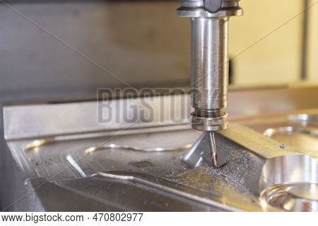 The Broken Cutting Tool On Cnc Milling Machine. Abstract Scene Of Bad Cutting Condition In Cnc Milli