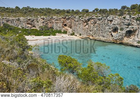 Turquoise Waters In Mallorca. Pilota Cove. Mediterranean Coastline. Spain