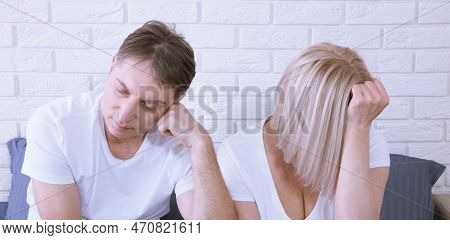 Unhappy Middle Aged Couple Has Problems In Relationships. Conflict In Family Concept. Tired From Lon