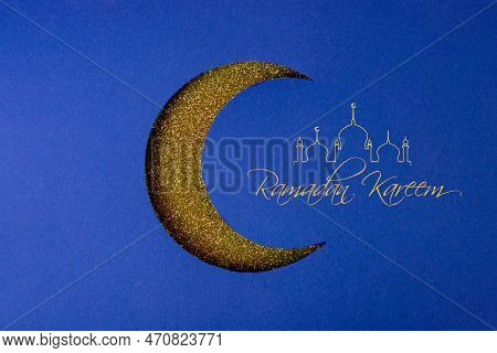Crescent Moon Cut Out Of Paper On A Glitter Background With Empty Space For Text. Symbol Of Eid Al-a