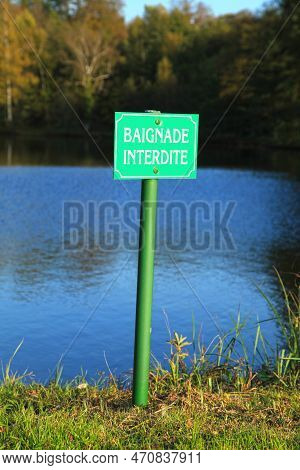 Sign By A Lake Saying In French 