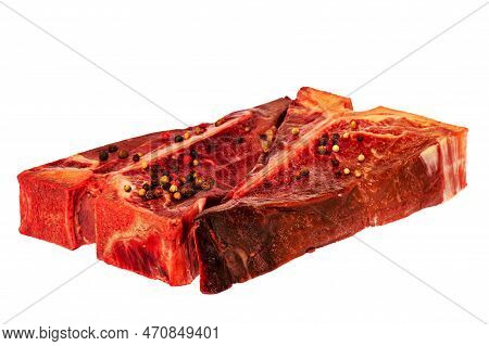 Two Raw Fresh Beef Steaks Ready To Cook. Meat With Pepper Spices.