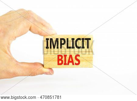 Implicit Bias Symbol. Concept Words Implicit Bias On Wooden Block. Beautiful White Table White Backg