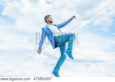 Successful Businessman Hurry Outdoor. Successful Businessman Hurry Outside.