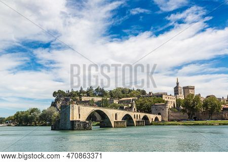 Saint Benezet Bridge And Palace Of The Popes In Avignon In A Beautiful Summer Day, France