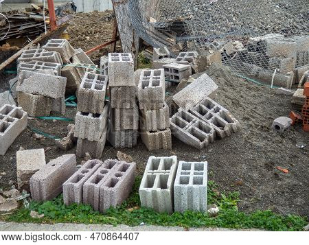 Building Blocks On The Ground. Material For The Construction Of Warm Houses. Progress. Construction 