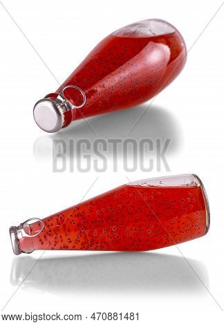 Set Of Red Drinks With Basil Seeds Or Falooda Seeds Or Tukmaria In Bottles On White Background