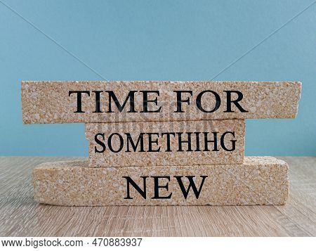 Time For Something New Symbol. Brick Blocks With Words 'time For Something New' On Wooden Table And 