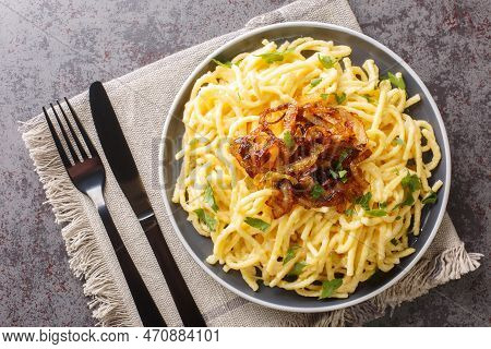 Kasespatzle Delicious Spatzle Noodles With Cheese And Fried Onion Top Close-up In A Plate On The Tab