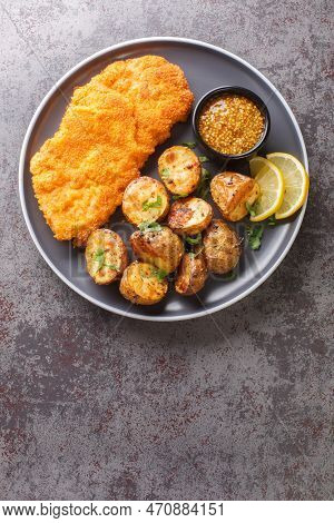 Munchner Schnitzel Veal Cutlets Are Brushed With A Combination Of Sweet Mustard And Horseradish Befo
