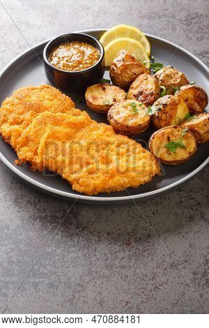 Munchner Schnitzel Veal Cutlets Are Brushed With A Combination Of Sweet Mustard And Horseradish Befo