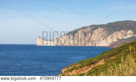 Rocky Cliffs On The Sea Coast. Sardinia, Italy. Nature Background