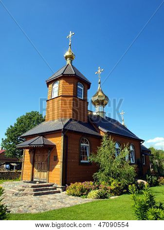 Picturesque Wooden Orthodox Church In The Village Kostomloty In Eastern Poland