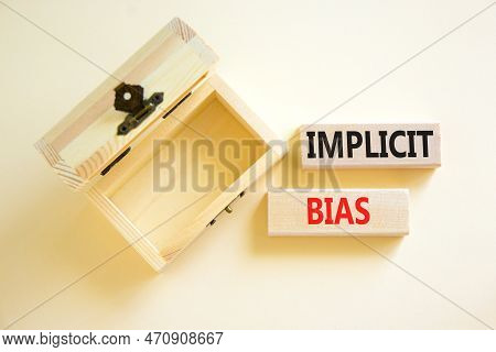 Implicit Bias Symbol. Concept Words Implicit Bias On Wooden Block. Beautiful White Table White Backg
