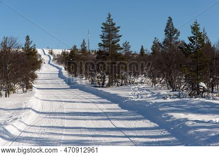 Tobogganing Slope In Saariselka Finland. Sunny Day