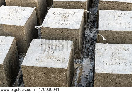 Rock Bolder. Four Square Cinder Blocks In A Row