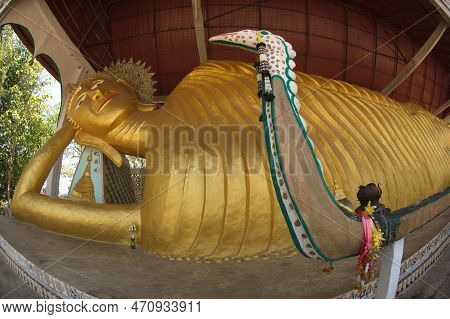 Kanchanaburi , Thailand - Apr 17, 2016 : A Large Golden Reclining Buddha Image At Wat Somdet, Amphoe
