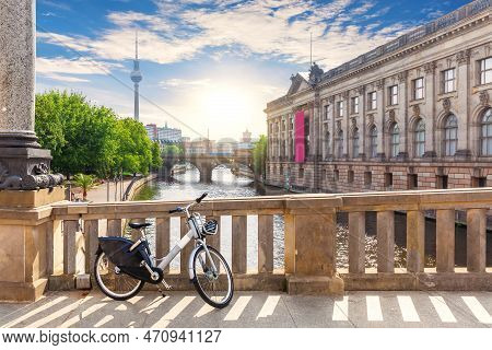 Bike In A Good Weather On The Bridge Over The River Spree In Berlin Near The Tv Tower And Museums, G