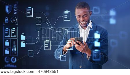 Black Smiling Businessman Working With Smartphone, Online Documentation Database And Files Storage H