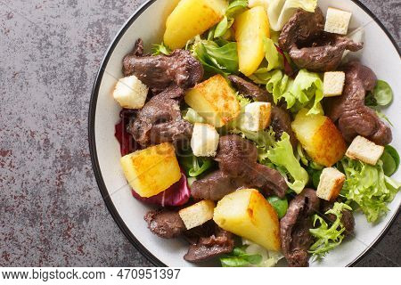 Salad Made With A Combination Of Gizzards, Onions, Potatoes, Shallots, Lettuce, Balsamic Vinegar, Ol