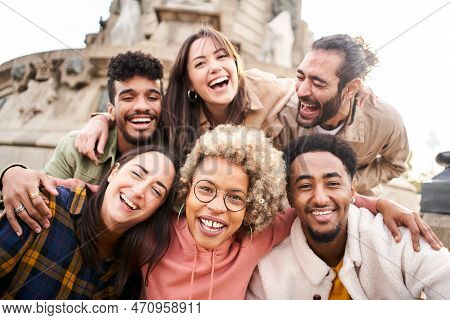 International Students With Beaming Smiles Are Posing For Selfie Shot Outdoors In University Campus.