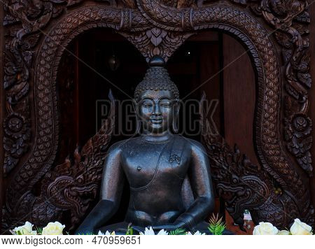 Close Up Of Buddha With Stone In The Background