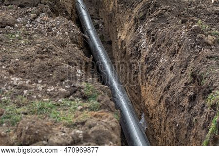 Industrial Plastic Polypropylene Pipe. Laying Sewage Pipes, Reconstruction Of Buildings And Houses. 
