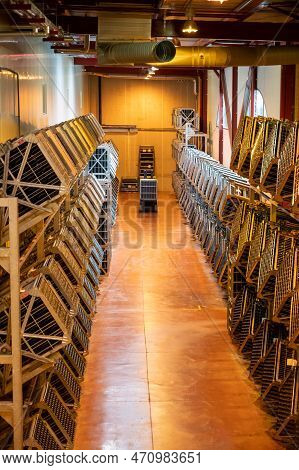 Production Of Cremant Sparkling Wine In Burgundy, France. Automatically Powered Riddling Remuage Box