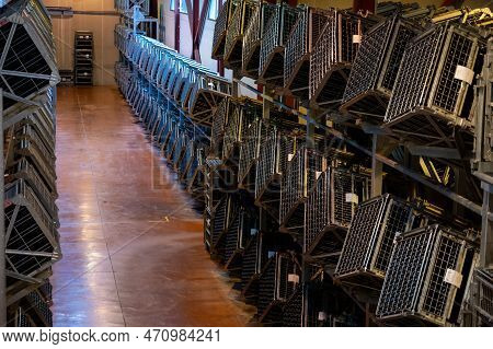 Production Of Cremant Sparkling Wine In Burgundy, France. Automatically Powered Riddling Remuage Box